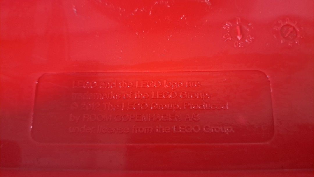 Authentic red LEGO storage brick, Model 4004 (Category: Lego & Building Sets) located in Quezon City. Submitted by hersheejubilo (Listing ID 1466901256, Image 3). Description: - Authentic red LEGO storage brick, Model 4004 (2012 release) - Manufactured in Poland by Room Copenhagen under official LEGO license - Made of durable polypropylene; clean and ready to use - Stackable design with 8 studs on top and 3 interior circles on the bottom - Versat