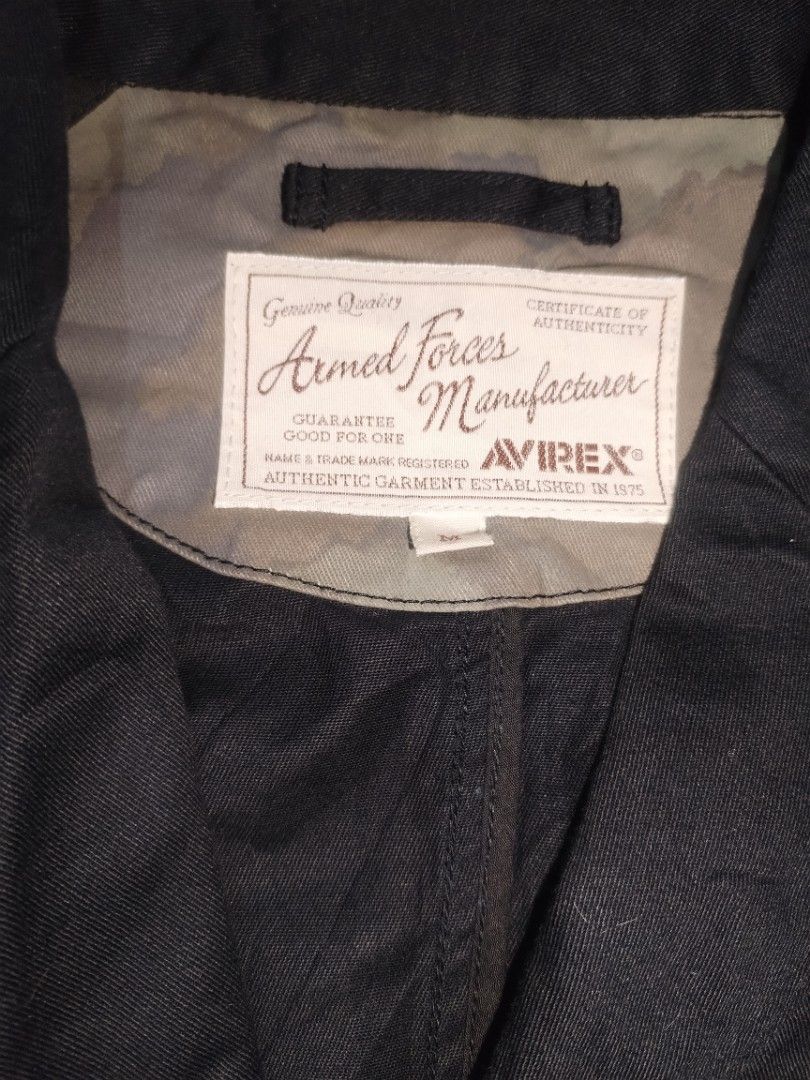 AVIREX Military Utility Blazer (Category: Coats, Jackets and Outerwear) located in Baguio. Submitted by luxeloomarchive (Listing ID 1466776460, Image 2). Description: Upgrade your casual style with this authentic AVIREX Military Utility Blazer. Crafted from durable black cotton canvas, this versatile piece features a rugged yet tailored design with a unique vertical zippered chest pocket and classic flap pockets. The interior collar is finished w
