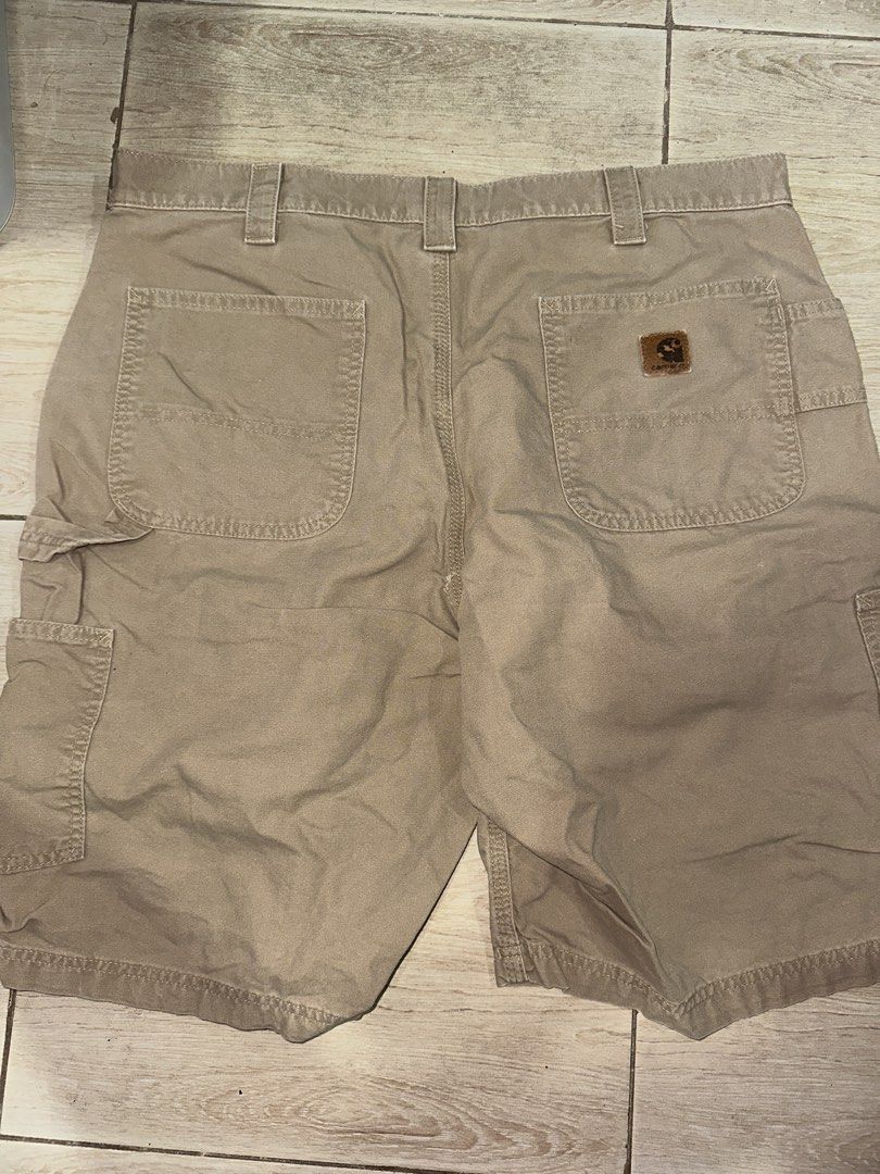 Carhartt B147 (DKH) Dark khaki Leather patch (Category: Shorts) located in Muntinlupa City. Submitted by kirbssss (Listing ID 1466851007, Image 1). Description: ₱1850 (nego) Waist 37-38 Length 22 small pin hole or scratch.