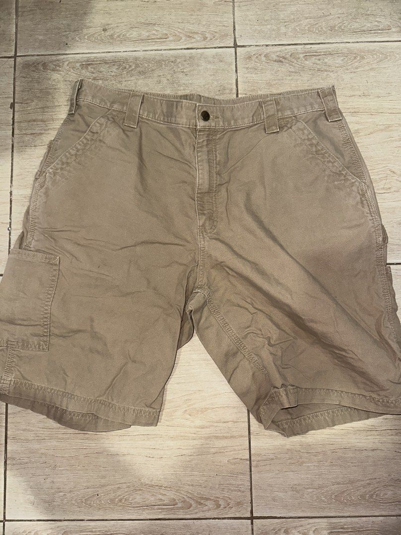 Carhartt B147 (DKH) Dark khaki Leather patch (Category: Shorts) located in Muntinlupa City. Submitted by kirbssss (Listing ID 1466851007, Image 2). Description: ₱1850 (nego) Waist 37-38 Length 22 small pin hole or scratch.