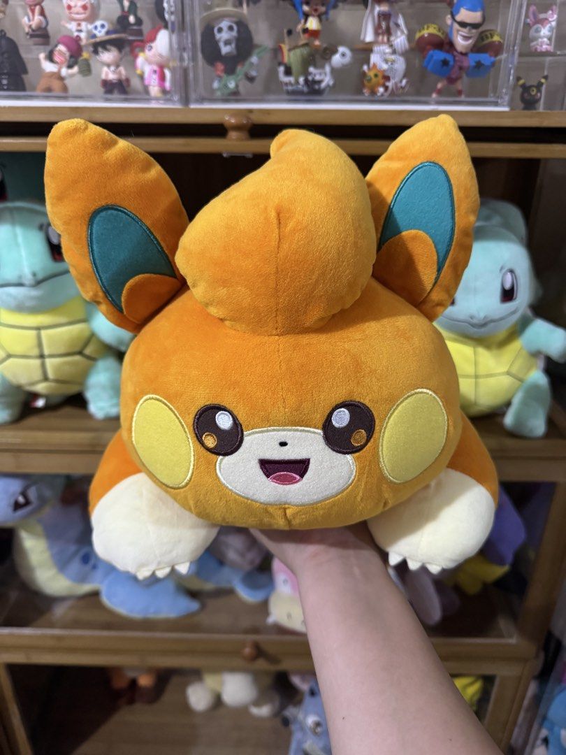 Banpresto Pawmi Pokémon Sleeping Plush (Category: Plushies & Soft Toys) located in Cainta. Submitted by mayhroeen (Listing ID 1466966319, Image 1). Description: Pawmi plush from Banpresto. Official tag attached, never removed. Super soft orange and cream fabric with embroidered facial features and paw pads. Approx medium size resting pose. Clean, smoke-free home storage. Great addition to any Pokémon collection..