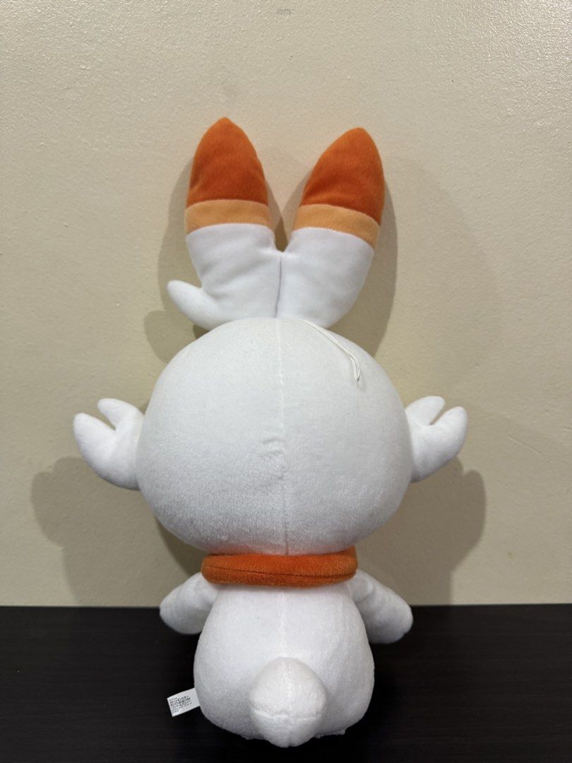 Banpresto Pokemon Scorbunny Plush (Category: Plushies & Soft Toys) located in Cainta. Submitted by mayhroeen (Listing ID 1466966339, Image 3). Description: - Official Banpresto Scorbunny plush - Complete with side tag - Features embroidered eyes, mouth, and stitched foot pads - Super soft fabric texture in sitting posture - Flawless, clean condition with no stains or loose threads.