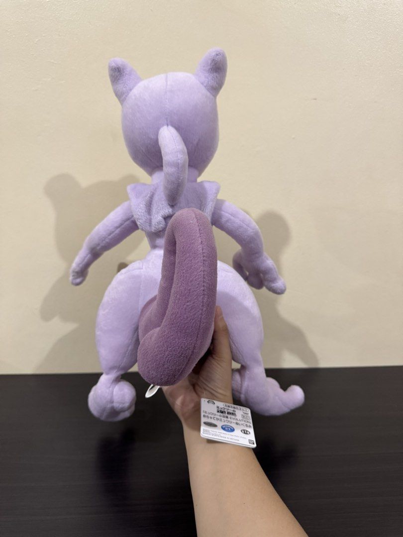 Banpresto Pokémon Mewtwo Evolution Plush Toy with Tags (Category: Plushies & Soft Toys) located in Cainta. Submitted by mayhroeen (Listing ID 1466966411, Image 3). Description: - Authentic Banpresto Pokémon Evolution Mewtwo plush - Made with soft, high-quality fabric in purple and light violet - Features detailed facial embroidery and iconic large curled tail - Sturdy build that stands upright nicely on display - A must-have for Pokémon fans and 