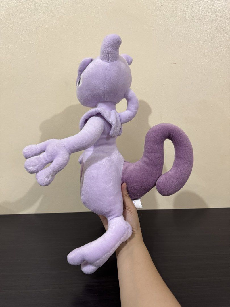 Banpresto Pokémon Mewtwo Evolution Plush Toy with Tags (Category: Plushies & Soft Toys) located in Cainta. Submitted by mayhroeen (Listing ID 1466966411, Image 2). Description: - Authentic Banpresto Pokémon Evolution Mewtwo plush - Made with soft, high-quality fabric in purple and light violet - Features detailed facial embroidery and iconic large curled tail - Sturdy build that stands upright nicely on display - A must-have for Pokémon fans and 