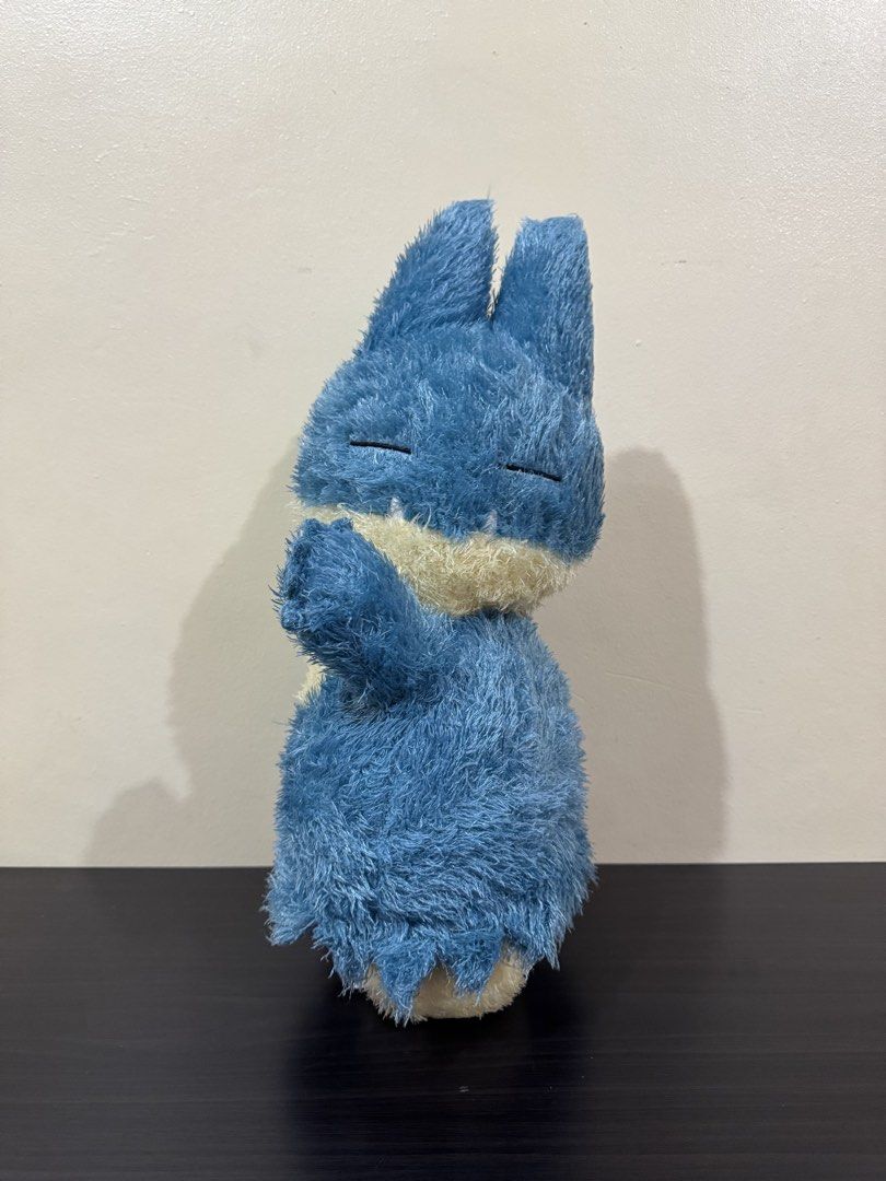 Banpresto Pokémon Munchlax Fluffy Plush Toy (Category: Plushies & Soft Toys) located in Cainta. Submitted by mayhroeen (Listing ID 1466966451, Image 2). Description: Official Banpresto Pokémon Munchlax plush. Blue and beige fuzzy texture all over. Closed eyes expression with small teeth detail visible at the mouth. Soft stuffing inside. Tag attached showing Bandai Spirits manufacture in Vietnam. Clean surface, smoke-free home..