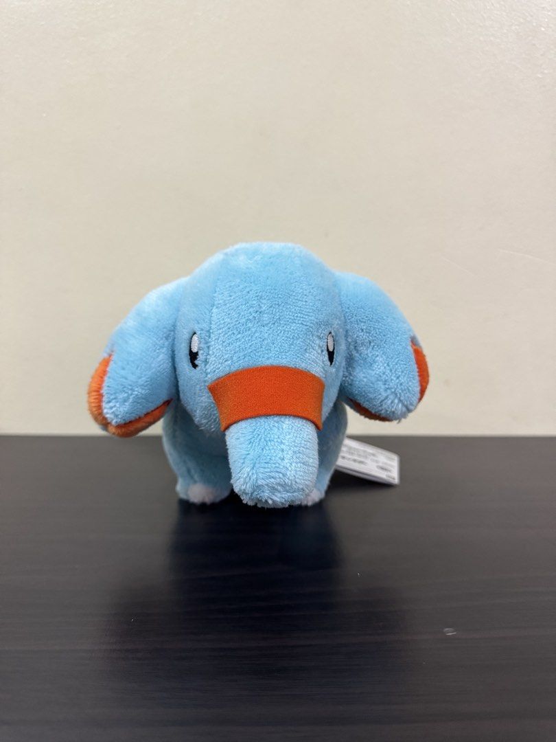 Banpresto Pokémon Phanpy Plush Toy (Category: Plushies & Soft Toys) located in Cainta. Submitted by mayhroeen (Listing ID 1466966348, Image 1). Description: - Item: Official Banpresto Pokémon Phanpy Plush - Condition: Brand new/clean, won straight from a claw machine - Authenticity: Official Nintendo merchandise with original paper tag and tush tag intact - Details: Soft blue fabric with signature orange accents on ears and snout - Origin: Made i