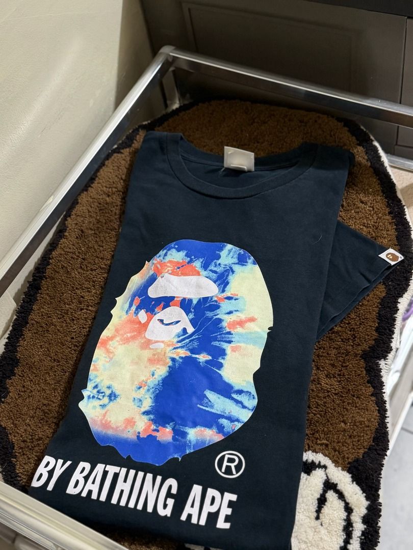 BAPE Tie-Dye Tee (Category: Tshirts & Polo Shirts ) located in Baguio. Submitted by snkr.essence (Listing ID 1466913810, Image 1). Description: BAPE Tie-Dye Tee Size: 2XL Condition: Used Inclusions: Price: ₱1,800 Check us out on: IG: snkr.essence Carousell: snkr.essence 🚚 📦Shipping Thru J&T (₱200 SF).