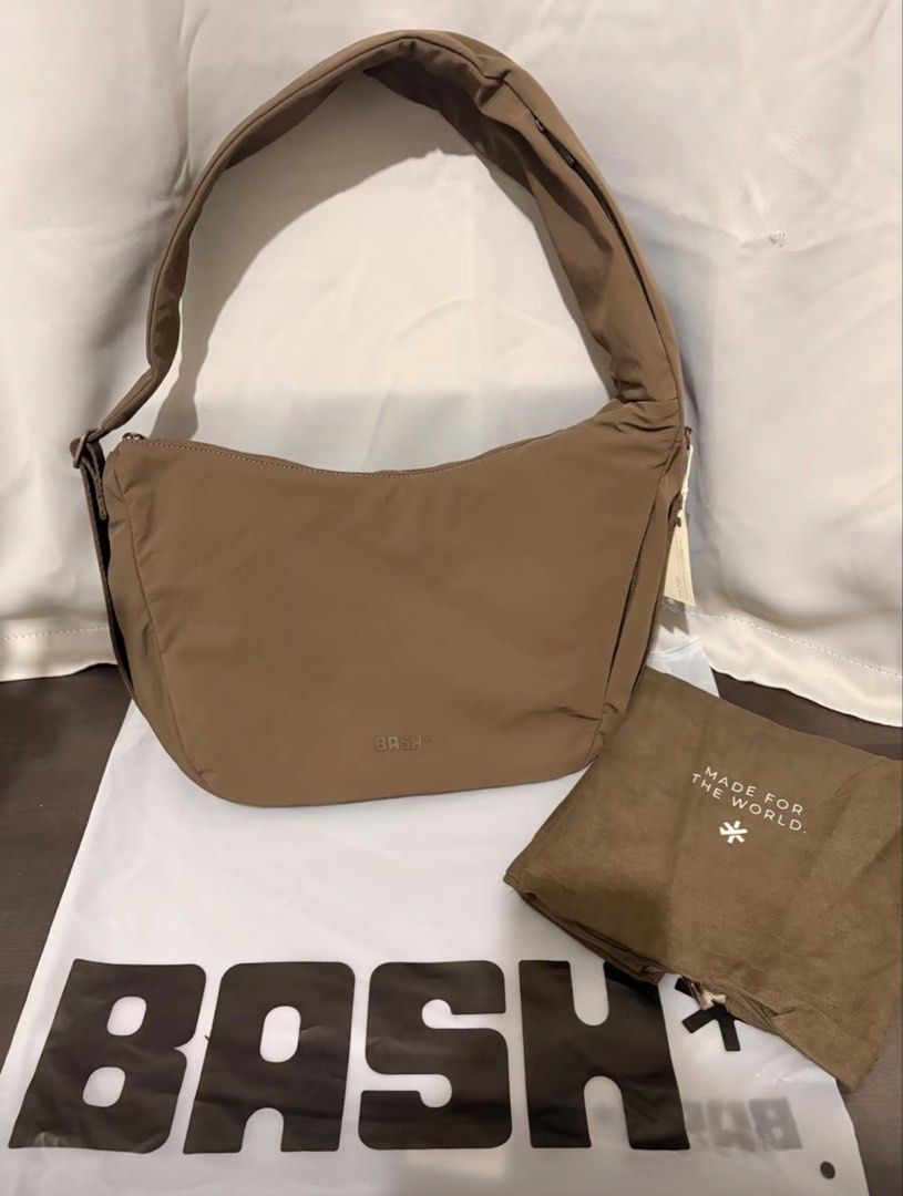 BASH Expedition On The Go bag (Category: Shoulder Bags) located in Pasay City. Submitted by ohjhayy (Listing ID 1466865261, Image 3). Description: - Brand: BASH - Color: TERRA - Condition: Like new / used once - for photoshoot only - Design: Versatile 2-in-1 style that converts from a shoulder bag to a sling bag - Strap: Adjustable for customized comfort - Inclusions: Comes with original BASH dust bag and protective packaging.