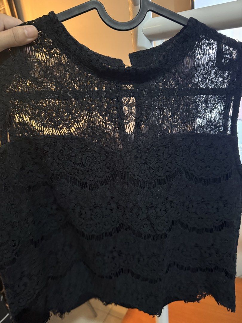 Basic lacy top (Category: Sleeveless) located in Quezon City. Submitted by essief (Listing ID 1466918860, Image 3). Description: Style is bit cropped Nice paired with high waisted bottoms ☺️ Dimensions shown in photos.