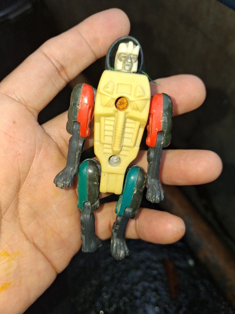 Beast Wars happy meal 1996 takara (Category: Action & Battle Toys) located in Manila. Submitted by marcas022798212 (Listing ID 1466841789, Image 3). Description: - Vintage 1996 Takara Black Wolf robot toy (stamped Takara and CW) - Striking yellow eyes with yellow and green body accents - Fully posable legs for dynamic posing - Condition: Shows minor dust accumulation from storage and light paint wear on metal screws - Perfect addition for retro t