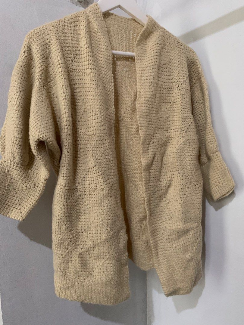 Beige Crochet Open Front Cardigan (Category: Coats, Jackets and Outerwear) located in Manila. Submitted by spaceshop12345 (Listing ID 1466867385, Image 3). Description: - Color: Neutral beige - Design: Open front with relaxed fit and dropped shoulders - Style: Mid-length with a textured crochet knit pattern - Versatility: Perfect for layering over any casual outfit - Condition: Great for extra warmth and everyday wear.