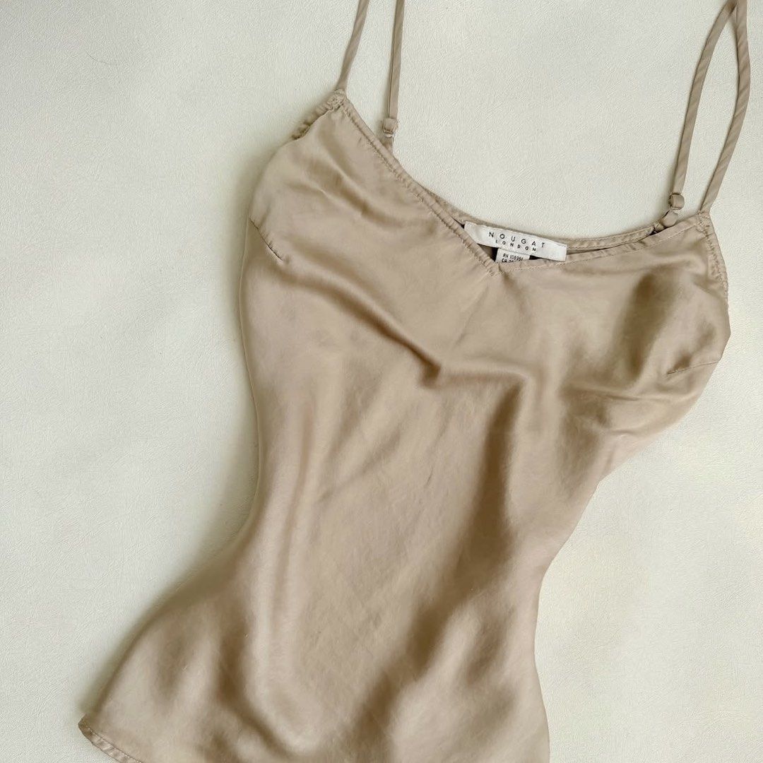 Beige Khaki Sleeveless Cami Top (Category: Sleeveless) located in Quezon City. Submitted by danalou (Listing ID 1466934675, Image 3). Description: - size small-semi medium - linen, silk like material - no flaws - used once only.