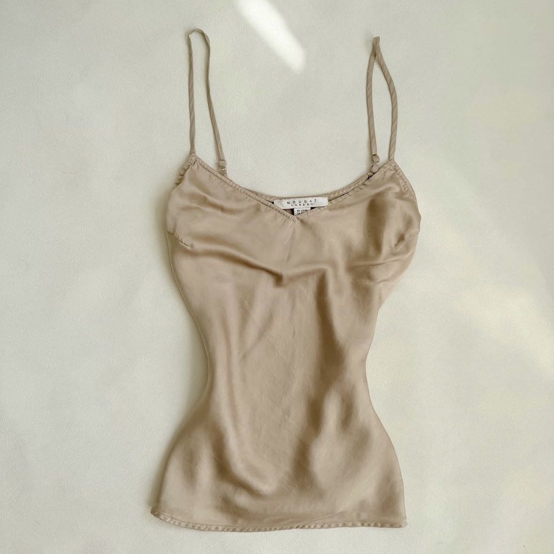 Beige Khaki Sleeveless Cami Top (Category: Sleeveless) located in Quezon City. Submitted by danalou (Listing ID 1466934675, Image 1). Description: - size small-semi medium - linen, silk like material - no flaws - used once only.