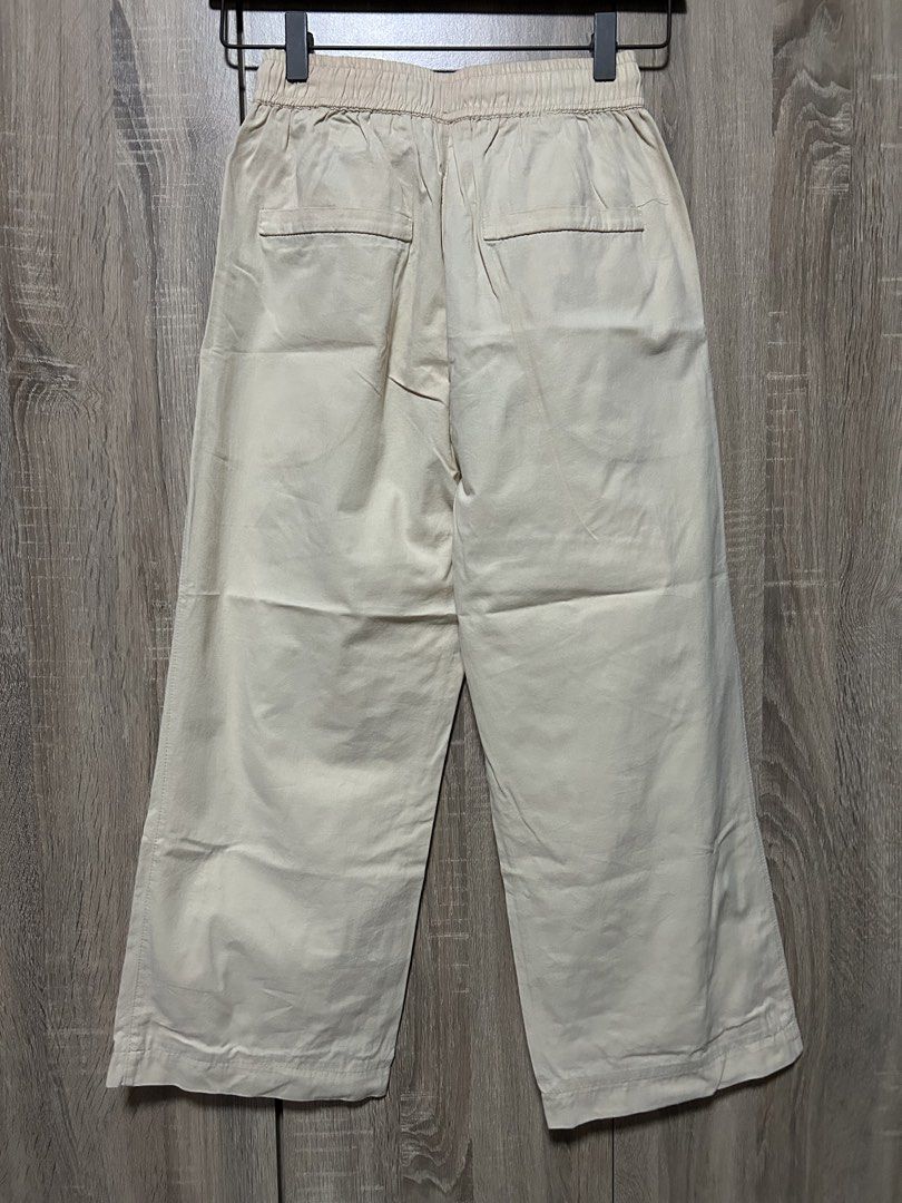 Beige Wide-Leg Pants (Category: Other Bottoms) located in Bulacan. Submitted by relove.re (Listing ID 1466776568, Image 2). Description: Neutral beige wide-leg pants with an elastic waistband and adjustable drawstring. Comfy, casual, and easy to style for everyday wear! Size XS to S ✨ Color: Beige ✨ Style: Wide-leg ✨ Waistband: Elastic with drawstring ✨ Condition: Please see photos for actual item condition 💛 Affordable finds at ReLove Collectio