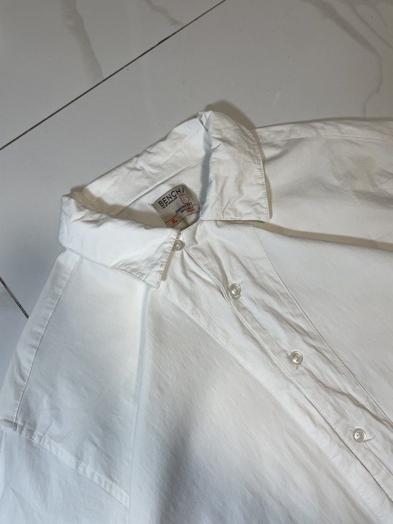 Bench Polo (Category: Shirts) located in Caloocan City. Submitted by iannacino (Listing ID 1466931857, Image 3). Description: Bench Polo XL on tag issue: discoloration lower part 229 +sf.