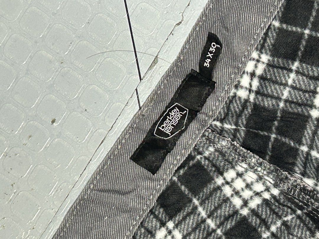 Berkley Jensen Flannel Lined Work Pants Gray 34x30 (Category: Jeans) located in San Simon. Submitted by ericdeinla69664 (Listing ID 1466793524, Image 3). Description: - Brand/Model: Berkley Jensen gray canvas work pants - Size: 34x30 (Normal fit, straight leg cut) - Warm Lining: Black and white plaid fleece interior for cold days - Storage: Convenient utility pockets on the side legs - Details: Back leather logo patch - Durability: Heavy-duty bui