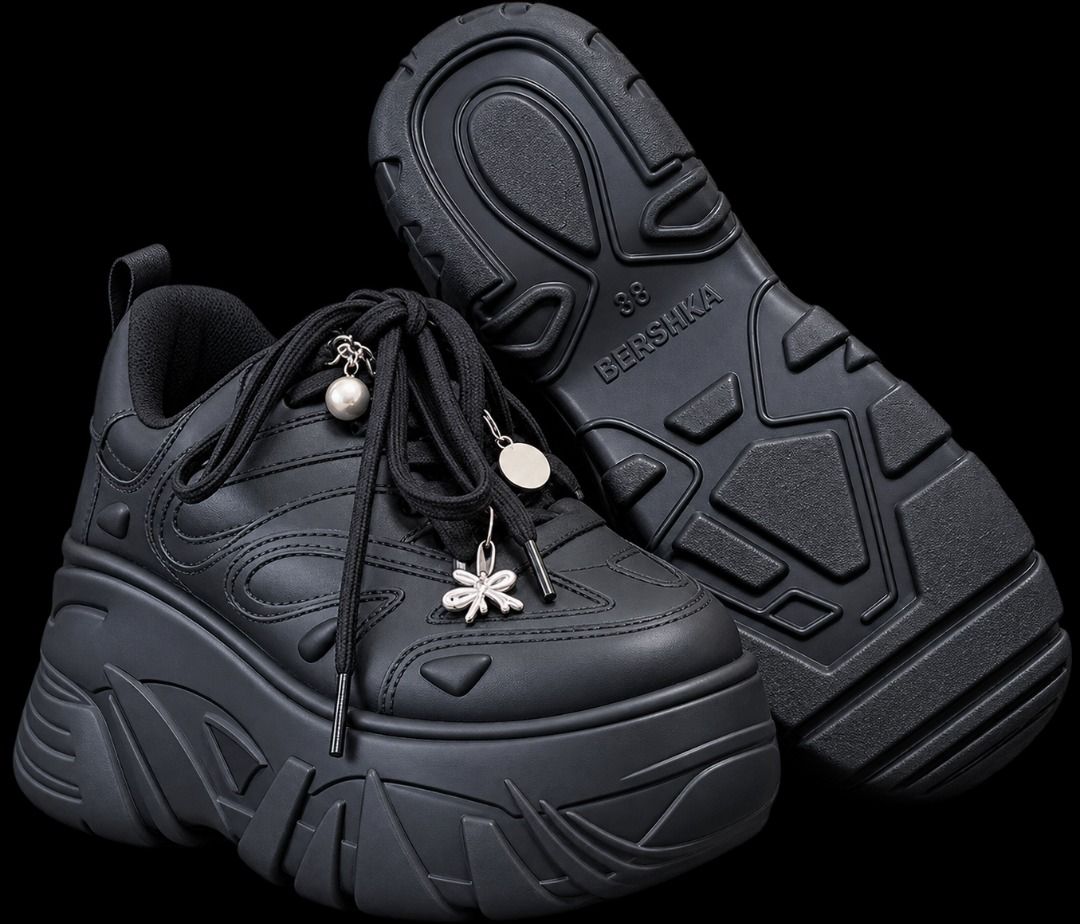 Bershka Black Platform Chunky Sneakers (Category: Sneakers) located in Quezon City. Submitted by pyress (Listing ID 1466925907, Image 1). Description: - Brand: Bershka - Size: 7 - Color: Matte black - Style: Super chunky platform sneakers with thick tread outsole - Special Features: Black laces decorated with trendy metal, pearl, and bow charms - Condition: Excellent statement shoes - used twice, bought at 4,595.