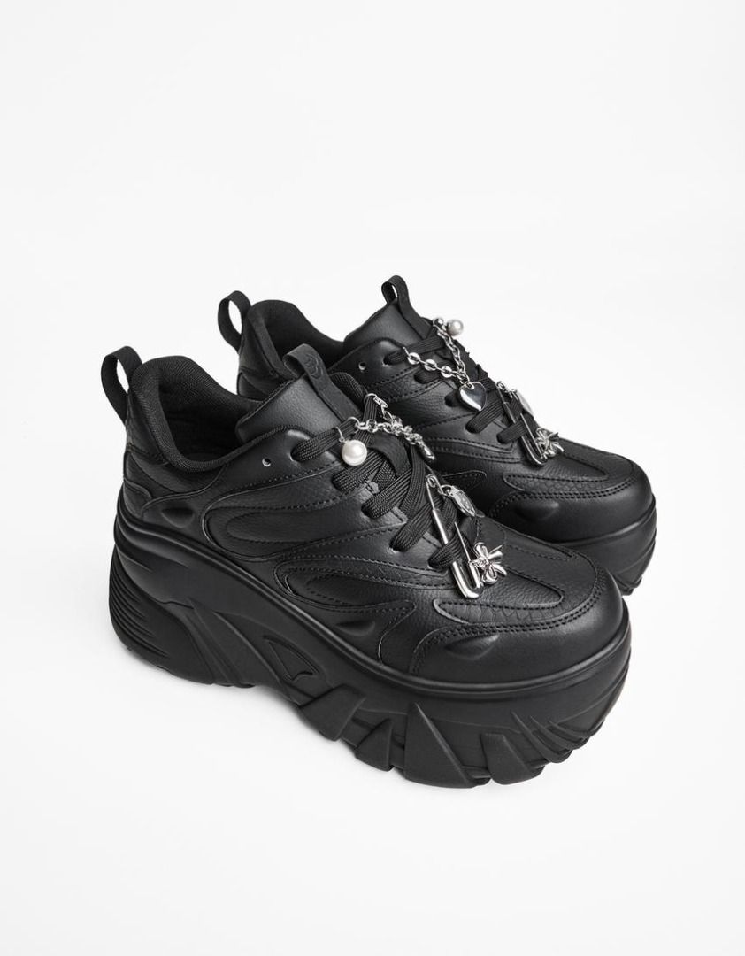 Bershka Black Platform Chunky Sneakers (Category: Sneakers) located in Quezon City. Submitted by pyress (Listing ID 1466925907, Image 2). Description: - Brand: Bershka - Size: 7 - Color: Matte black - Style: Super chunky platform sneakers with thick tread outsole - Special Features: Black laces decorated with trendy metal, pearl, and bow charms - Condition: Excellent statement shoes - used twice, bought at 4,595.
