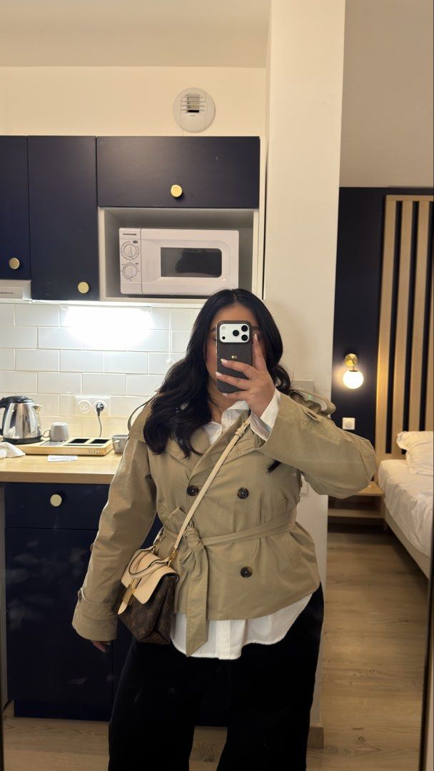 Bershka Short Trench Coat (Category: Coats, Jackets and Outerwear) located in Quezon City. Submitted by _shopjhcloset (Listing ID 1466910261, Image 1). Description: Bershka Trench Coat (orig: ₱3,595) Size: L Color: Khaki **Worn once only Perfect for: Stylish autumn layering and everyday chic outfits.