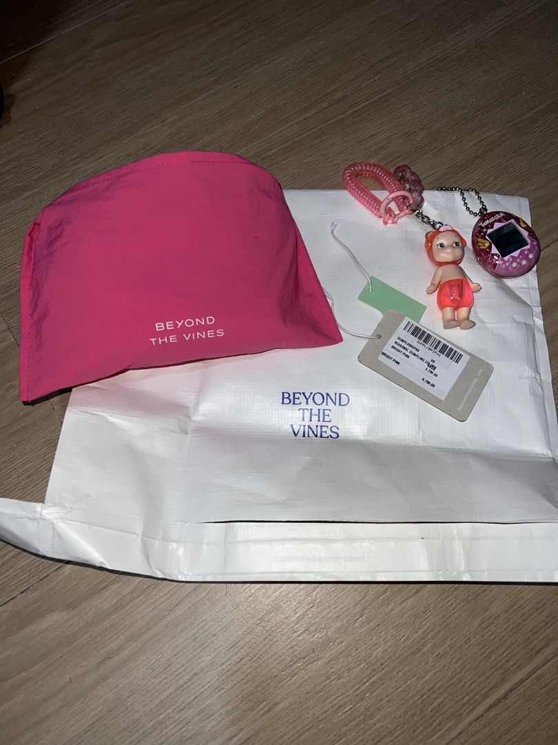 Beyond the vines dumpling bag XS (Category: Cross-body Bags) located in Rizal. Submitted by decluttering.mess (Listing ID 1466930638, Image 3). Description: • Beyond the Vines • XS (can fit a looot — ipad, tumblr, etc) • used a few times only • seasonal color: hot pink • clean inside & out keychains not included #beyondthevines #pink #dumpling #bag #casual #everydaybag .