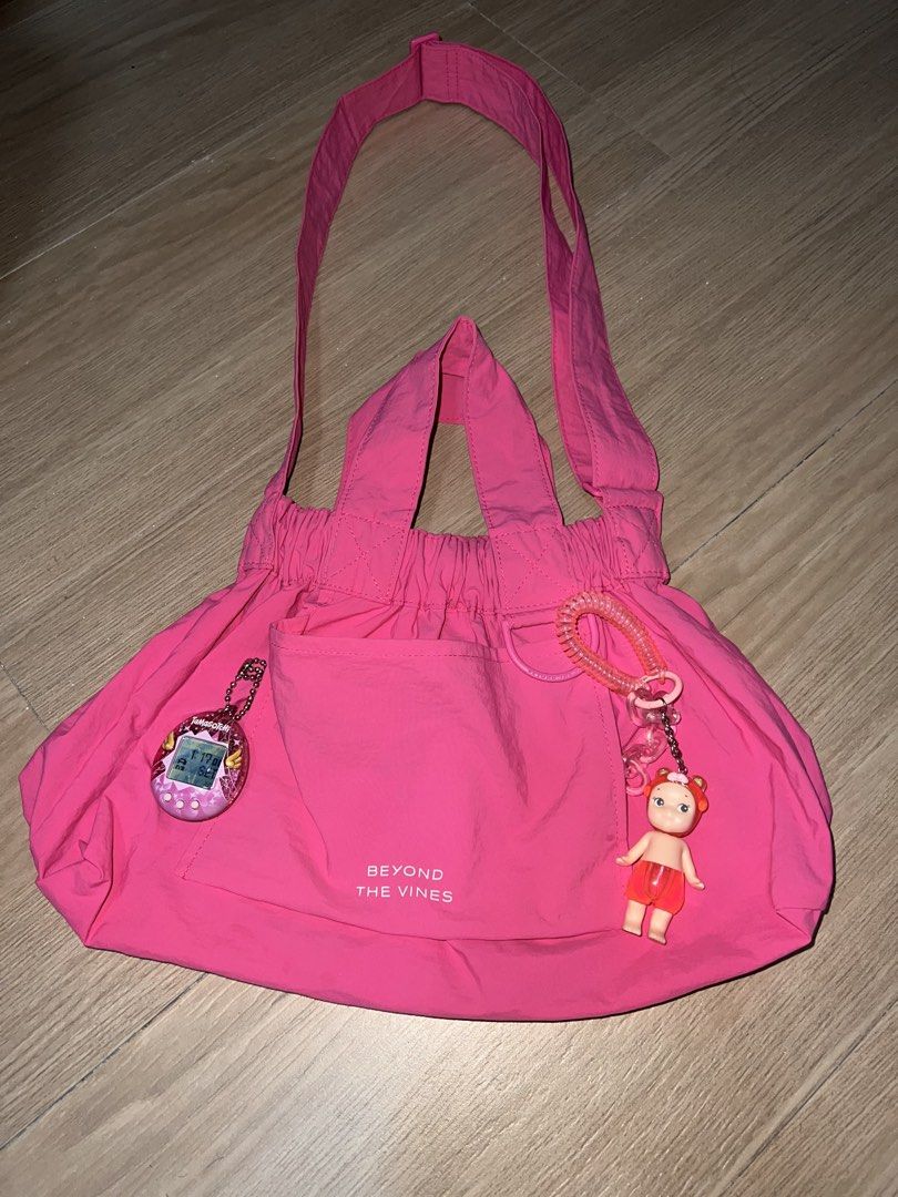 Beyond the vines dumpling bag XS (Category: Cross-body Bags) located in Rizal. Submitted by decluttering.mess (Listing ID 1466930638, Image 1). Description: • Beyond the Vines • XS (can fit a looot — ipad, tumblr, etc) • used a few times only • seasonal color: hot pink • clean inside & out keychains not included #beyondthevines #pink #dumpling #bag #casual #everydaybag .