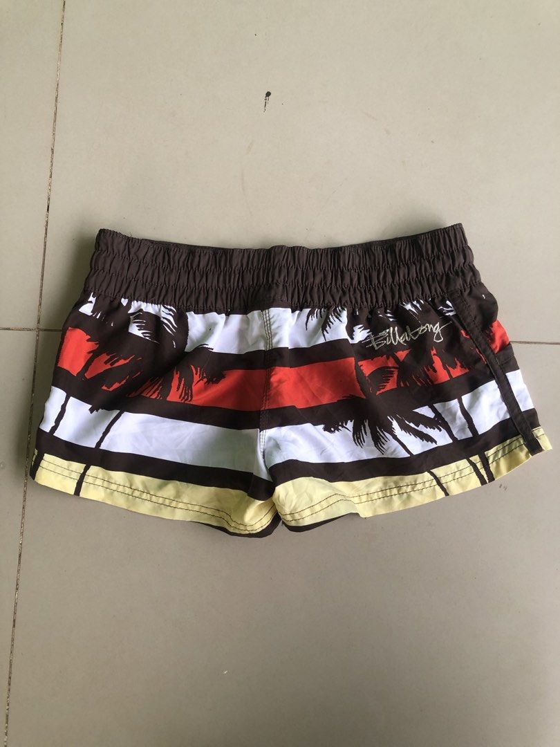 Billabong Surf Satin Boardshorts (Category: Shorts) located in Cagayan de Oro. Submitted by leklekthrift (Listing ID 1466891356, Image 1). Description: Billabong surf satin boardshorts with a cool palm tree tropical print. Brown, white, red, and yellow stripes. Elastic waistband with drawstring closure. Soft material, great for the beach or pool days. Made in China..