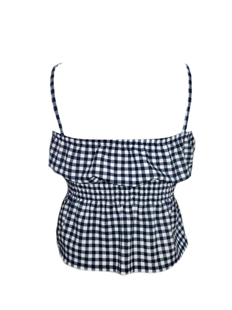 Black and white gingham spaghetti strap cami top (Category: Sleeveless) located in Manila. Submitted by thriftythreads1903 (Listing ID 1466931497, Image 2). Description: - Classic black and white check pattern - Square neckline with adjustable thin spaghetti straps - Stretchy smocked bodice for a comfortable, fitted look - Cute white lace trim detail across the front - Flared ruffle hem for a fun, breezy vibe - Ideal for sunny weather and easy to