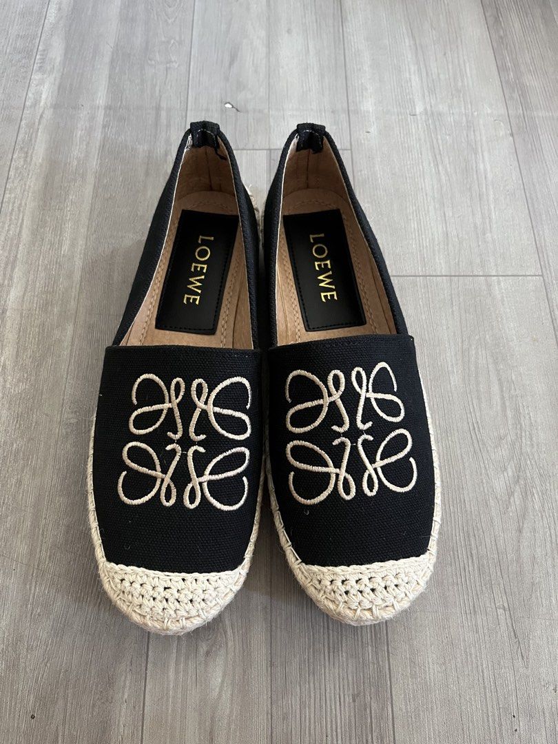 Black Canvas Espadrilles (Category: Flats & Sandals) located in Subic. Submitted by yuridecluttersxz (Listing ID 1466808952, Image 1). Description: Black Canvas Espadrilles / Loafers - Size: Size 37 / US 6 - Style: Black canvas espadrilles with slip-on loafer silhouette - Details: Cream embroidered Anagram logo on vamp, jute woven platform sole with braided edges, and black leather insole - Condition: Brand new with box - RFS: Does not fit Shippi