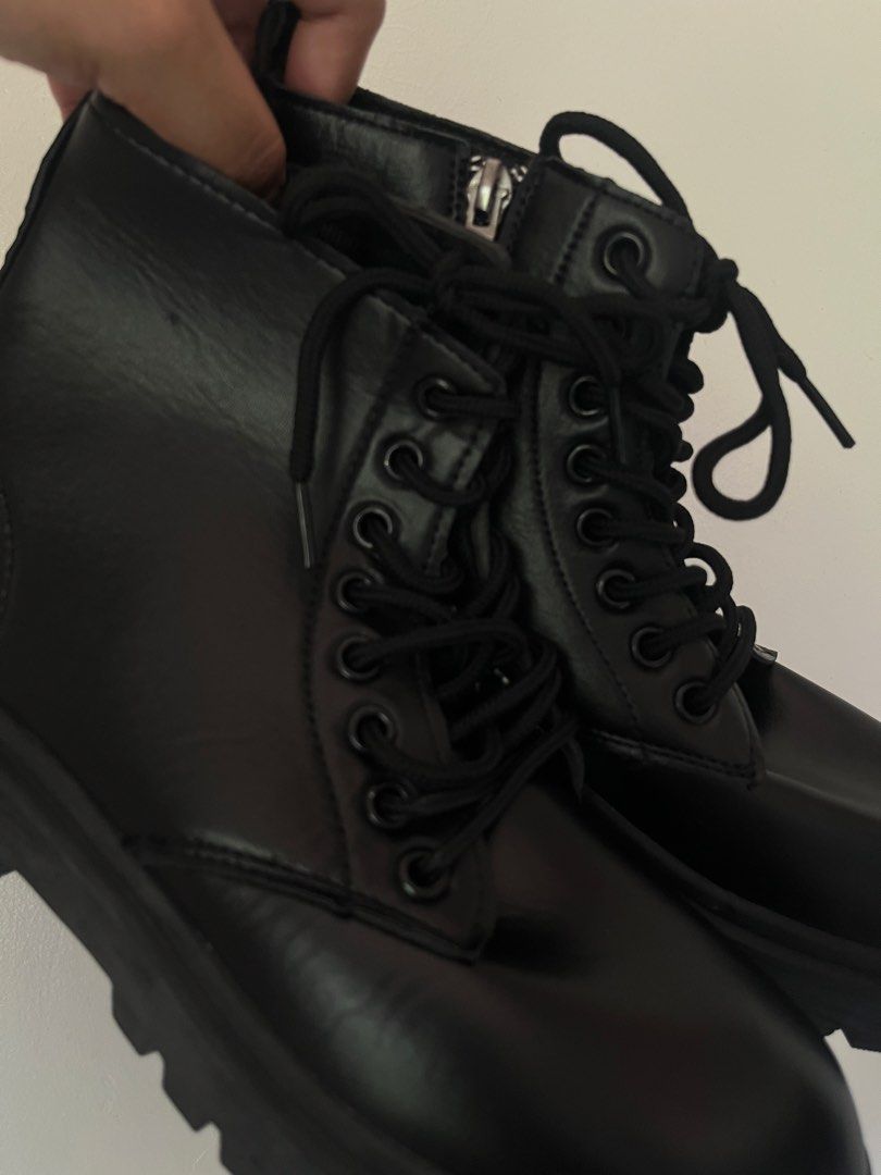 Black combat boots with side zipper and laces (Category: Boots) located in Manila. Submitted by epiccloud_1897cb (Listing ID 1466800293, Image 1). Description: - Color: Classic black (goes with everything) - Design: Mid-calf height with smooth upper material - Closure: Lace-up front + handy side zipper for easy on/off - Sole & Heel: Chunky lug sole with a sturdy block heel - Style: Great for edgy outfits and ideal daily footwear for cooler weathe