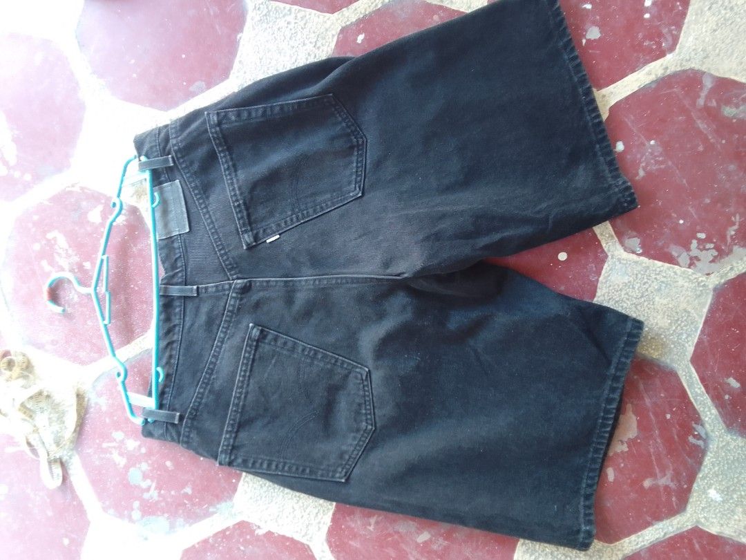 Black denim baggy shorts (Category: Shorts) located in Manila. Submitted by max_444 (Listing ID 1466887593, Image 3). Description: - Style: Baggy fit denim shorts with a mid-length cut - Color/Wash: Black dark wash with a subtle vintage fade - Details: Classic five-pocket style, metal button closure, and zip fly - Features: Waistband with belt loops - Condition: Brand new / Excellent quality - Perfect for: Casual, streetwear, and everyday wear -S