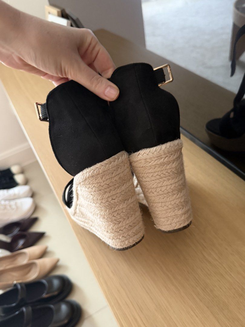 Black Espadrille Wedge Sandals with Ankle Strap (Category: Wedges) located in Manila. Submitted by ania_g (Listing ID 1466865984, Image 3). Description: - Style: Platform wedge sandals with woven jute heel - Color: Black with gold-tone hardware - Details: Open toe, wide front strap, and side buckle ankle closure - Size: 36 (marked on sole) - Condition: Clean, soles show minimal wear.