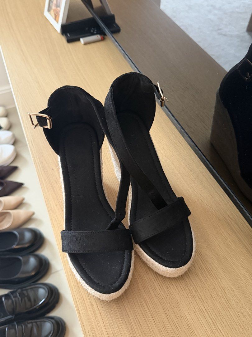 Black Espadrille Wedge Sandals with Ankle Strap (Category: Wedges) located in Manila. Submitted by ania_g (Listing ID 1466865984, Image 2). Description: - Style: Platform wedge sandals with woven jute heel - Color: Black with gold-tone hardware - Details: Open toe, wide front strap, and side buckle ankle closure - Size: 36 (marked on sole) - Condition: Clean, soles show minimal wear.