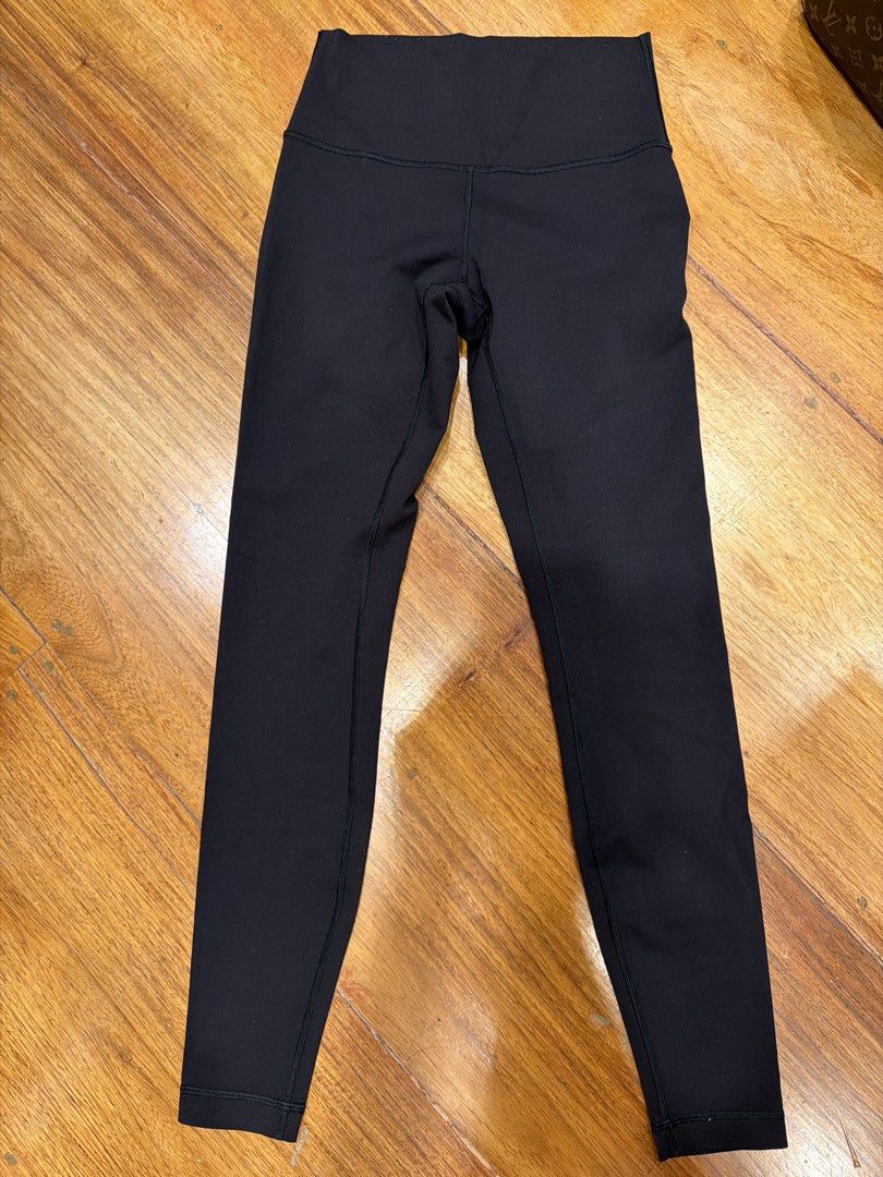 Black high-rise activewear leggings (Category: Activewear) located in Quezon City. Submitted by nic.man (Listing ID 1466968319, Image 1). Description: - Color: Solid black - Fit: High waistband design - Material: Smooth, stretchy fabric - Design: Minimalist athletic style with clean ankle hems - Versatility: Ideal for workouts or everyday lounging.