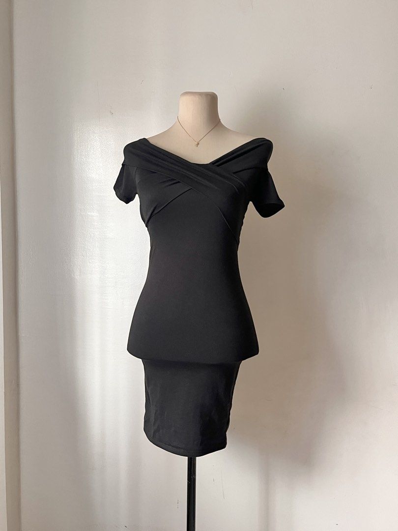 Black off-shoulder crossover bodycon dress (Category: Dresses) located in Pasig City. Submitted by lovebella.apparel (Listing ID 1466950163, Image 2). Description: VXN marina dress 𐙚 – ₱150 – xs to medium – great quality (i sweat) – stretchable – worn once for content – og price: ₱269 📍pasig/antipolo DM or comment "mine" to order. (𝘛𝘩𝘦 𝘤𝘰𝘭𝘰𝘳 𝘮𝘢𝘺 𝘷𝘢𝘳𝘺 𝘥𝘶𝘦 𝘵𝘰 𝘭𝘪𝘨𝘩𝘵𝘪𝘯𝘨).