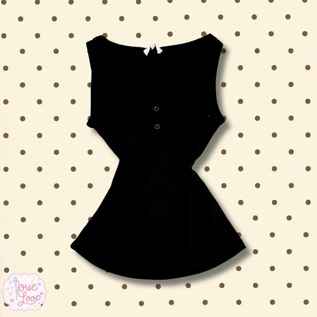 Black Ribbed Sleeveless Button-Up Top (Category: Sleeveless) located in Manila. Submitted by love.loop (Listing ID 1452781050, Image 1). Description: - Black ribbed sleeveless top - Button-up front with three buttons - Scoop neck - Flared hem - Tag indicates size XS - Versatile for layering or wearing alone.