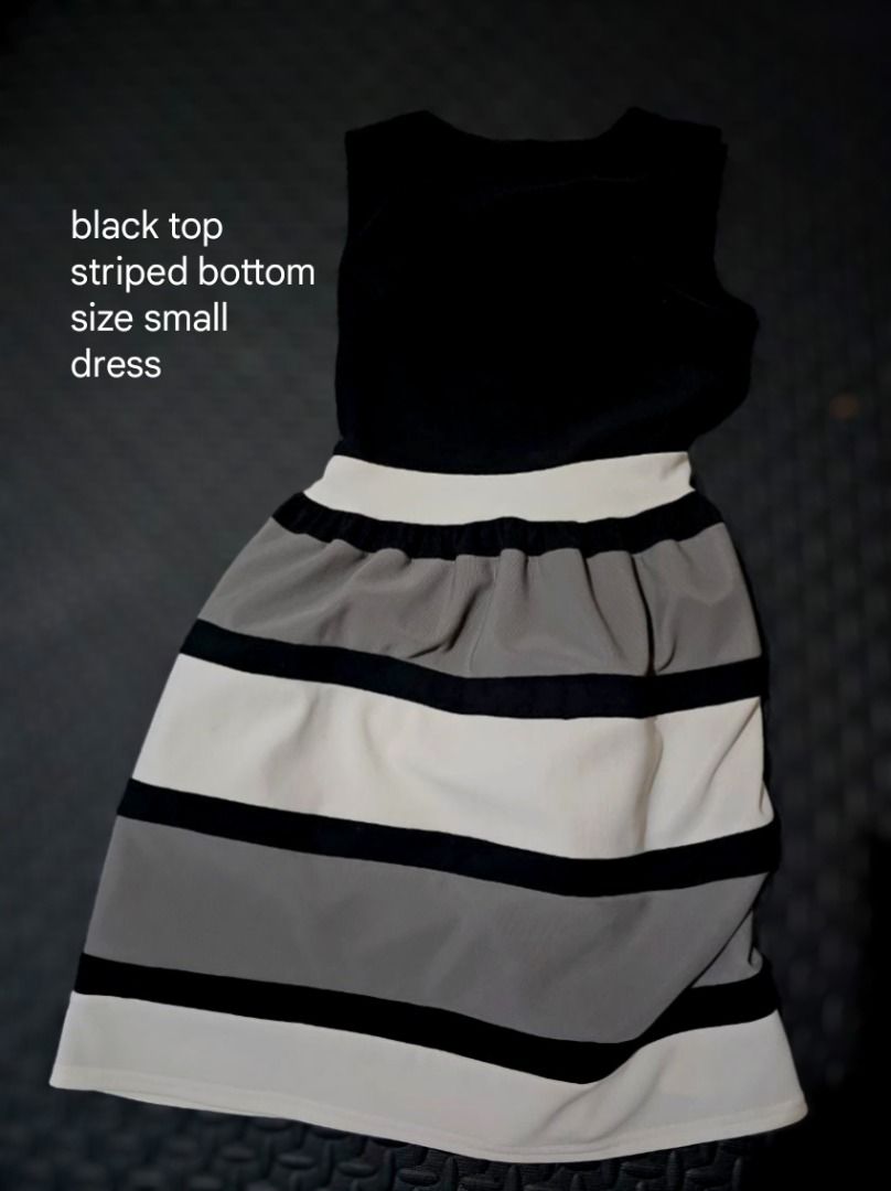 Black Top Striped Bottom Size Small Dress (Category: Dresses) located in Lapu Lapu. Submitted by goodstuff_cebu (Listing ID 1466950068, Image 1). Description: - Style: Sleeveless top with attached striped skirt - Colors: Black top; white, grey, and black horizontal striped skirt - Fit: Fitted waist with a flattering wide white band, size small - Length: Knee-length - Material: Smooth, slightly stretchy, and comfortable - Used twice, does not fit 