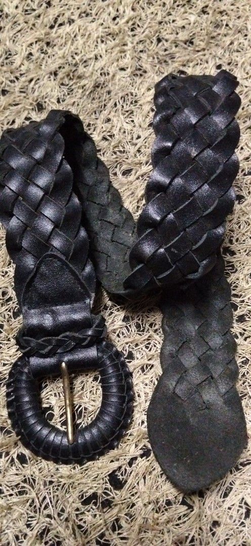 Black Woven pure solid genuine Leather Belt with Round Buckle (Category: Belts) located in Paranaque City. Submitted by michael-08 (Listing ID 1466851006, Image 2). Description: - Style: Classic vintage look, perfect for everyday outfits - Material: Sturdy black woven leather with a textured finish - Design: Wide braided strap with a rounded tip end - Hardware: Round leather-wrapped buckle featuring a gold-toned metal pin - Versatility: Great for