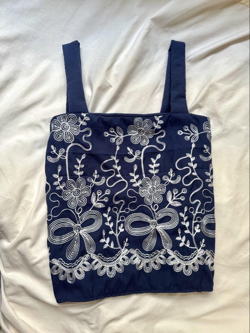 Blue Embroidery Sleeveless Top (Category: Blouses) located in Davao. Submitted by charmisokay (Listing ID 1466801714, Image 1). Description: Never been work; bought on TikTok shop for ₱499 pesos (Quite small on the bust area, best fits up to small) .