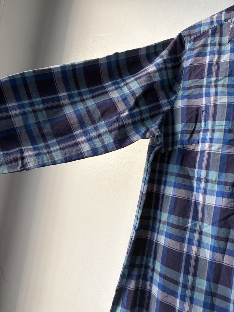 Blue Plaid Button-Down Shirt Dress (Category: Dresses) located in Las Pinas. Submitted by bibliomomma (Listing ID 1466856996, Image 3). Description: Blue plaid shirt dress with light blue and white accents. Features a button-down front, collared neckline, 3/4 sleeves, and front pockets. Casual, comfy, and easy to style for everyday wear. Can be worn as a dress or layered over jeans Pit to pit 18 inches when laid flat Length 31.5 inches.