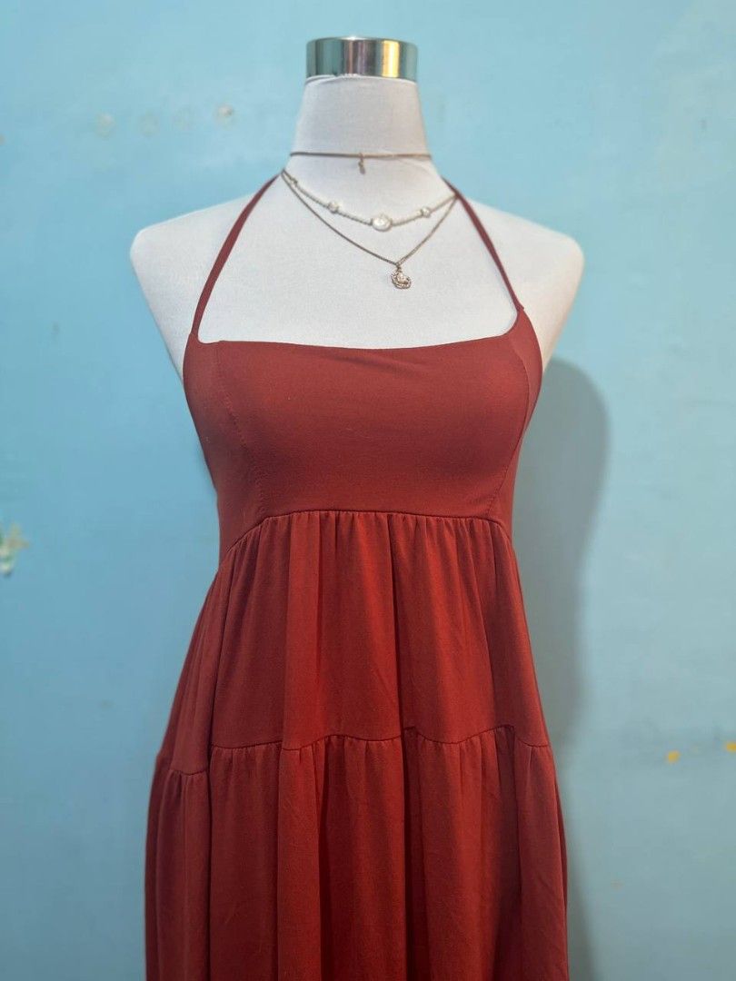 Brown and rust orange dress bundle trio (Category: Dresses) located in Manila. Submitted by seannathan46011 (Listing ID 1466812967, Image 2). Description: - Set of 3 stylish and soft dresses for everyday wear - Dress 1: Brown polo shirt dress with asymmetric buttons and chest pocket - Dress 2: Rust orange halter neck tiered dress with square neckline - Dress 3: Brown mock neck dress with short puff sleeves and rolled cuffs - Made from ultra-soft 
