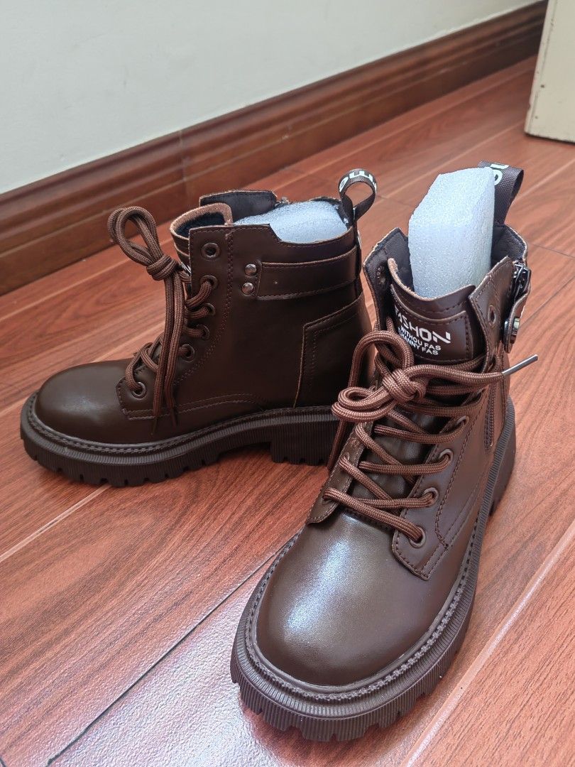 Brown combat boots (size 35) (Category: Boots) located in Manila. Submitted by twinkle_love (Listing ID 1466795885, Image 2). Description: Brown combat boots with thick lug soles (5cm). internal increase(2cm) with side zippers for quick wear. Black fleece lining inside keeps warm. with shoe box..