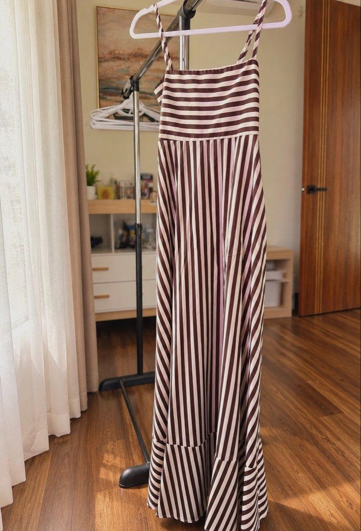 Brown Striped Maxi Dress (Category: Dresses) located in Santa Rosa. Submitted by rainscloset29 (Listing ID 1466782012, Image 1). Description: . Brand: No brand . Size: Free size (best fits Small to Medium) . Fit: Fits my 38” bust just right . Style: Spaghetti straps, smocked back, and flowy maxi skirt . Condition: Worn once only . Pickup: Nuvali, Santa Rosa, Laguna . Delivery: Via Lalamove or LBC (shipping fee c/o buyer) . Please note that the ac