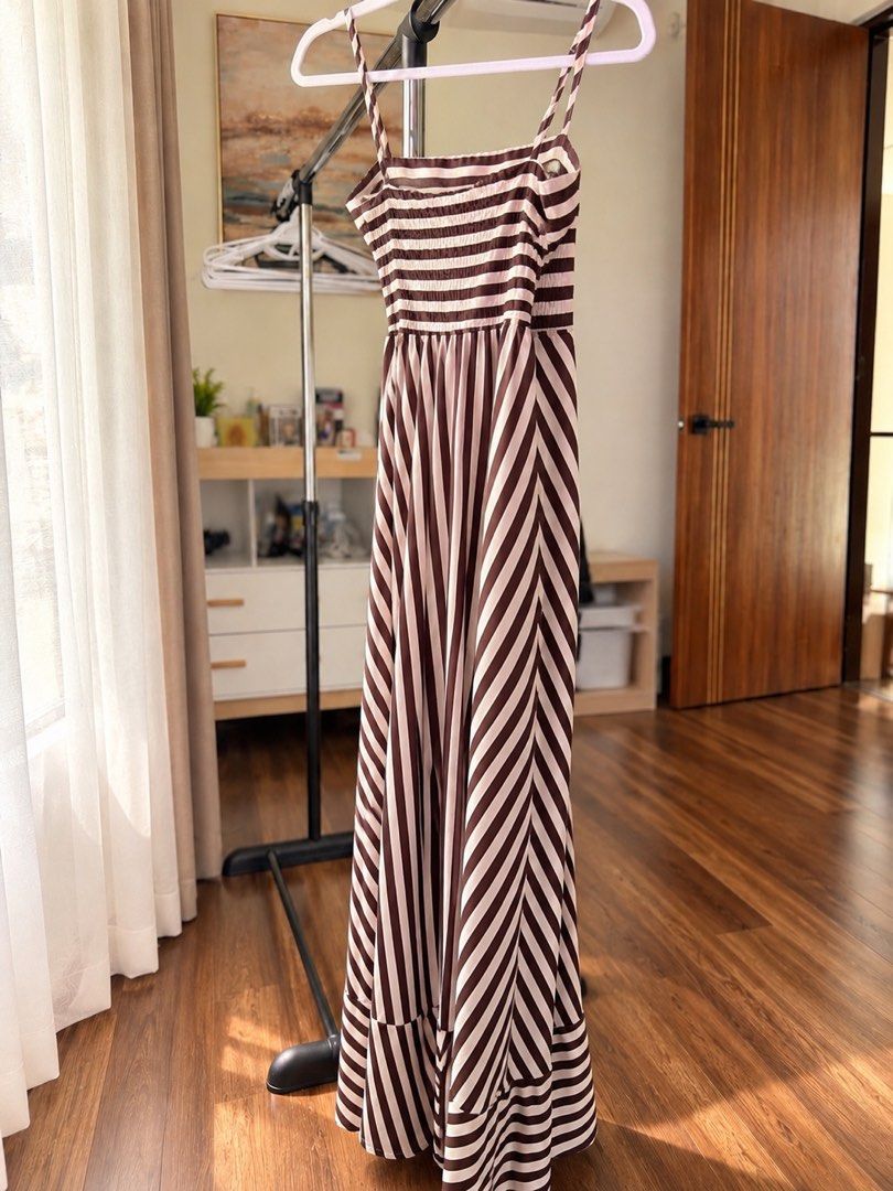 Brown Striped Maxi Dress (Category: Dresses) located in Santa Rosa. Submitted by rainscloset29 (Listing ID 1466782012, Image 3). Description: . Brand: No brand . Size: Free size (best fits Small to Medium) . Fit: Fits my 38” bust just right . Style: Spaghetti straps, smocked back, and flowy maxi skirt . Condition: Worn once only . Pickup: Nuvali, Santa Rosa, Laguna . Delivery: Via Lalamove or LBC (shipping fee c/o buyer) . Please note that the ac