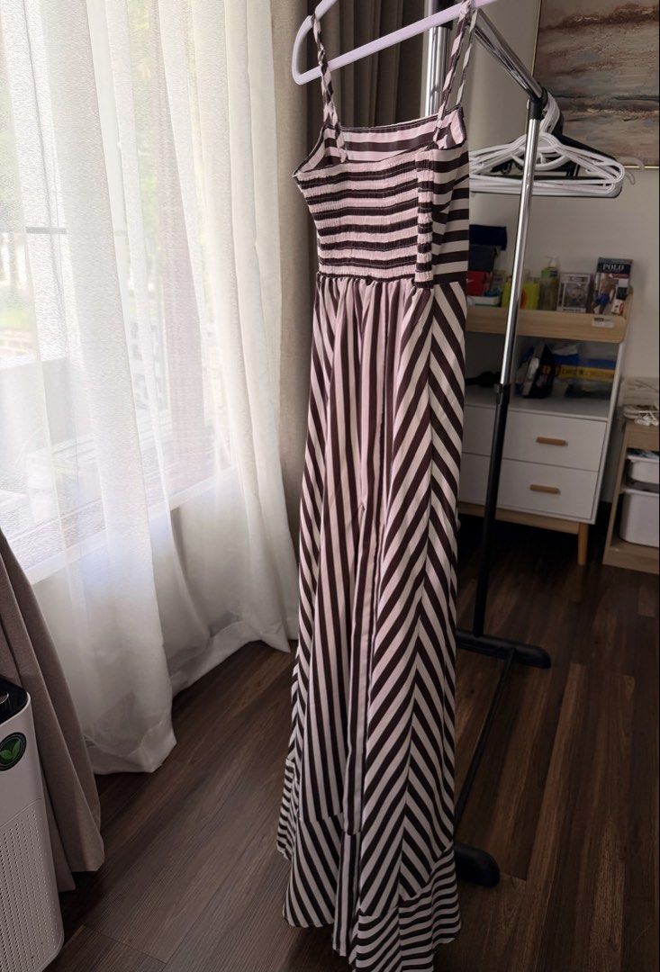 Brown Striped Maxi Dress (Category: Dresses) located in Santa Rosa. Submitted by rainscloset29 (Listing ID 1466782012, Image 2). Description: . Brand: No brand . Size: Free size (best fits Small to Medium) . Fit: Fits my 38” bust just right . Style: Spaghetti straps, smocked back, and flowy maxi skirt . Condition: Worn once only . Pickup: Nuvali, Santa Rosa, Laguna . Delivery: Via Lalamove or LBC (shipping fee c/o buyer) . Please note that the ac