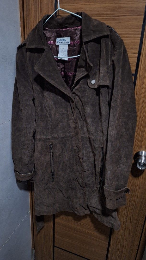 Brown Suede Trench with Belt (Category: Coats, Jackets and Outerwear) located in Manila. Submitted by naldnaldra61670 (Listing ID 1466890641, Image 2). Description: - Color: Deep brown - Material: Soft suede - Length: Long with matching waist belt - Closure: Button-up front with classic collar - Sleeves: Long with zippers at the cuffs - Style: Great layering piece for cooler weather - Needs Wash - XS to Small. Kasya ng Med pero fitted na..
