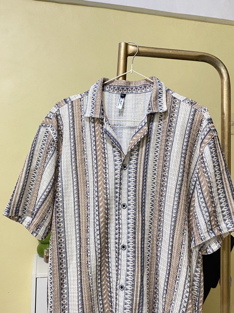 BROWN SUMMER POLO IN PATTERN (Category: Tshirts & Polo Shirts ) located in Dasmarinas. Submitted by hannah.oakph (Listing ID 1466832049, Image 3). Description: .