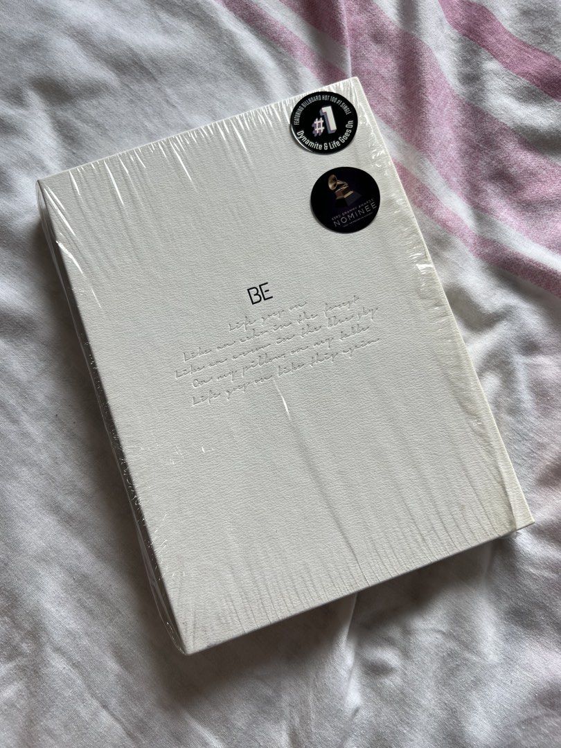 BTS BE Album Essential/Deluxe Edition (Category: CDs & DVDs) located in Rizal. Submitted by eurea1864 (Listing ID 1466864727, Image 1). Description: - Official BTS BE album set from Big Hit Entertainment - Unsealed and in great, well-maintained condition - Includes CD, outer box, and photobook - Comes with photocards featuring J-Hope, Jimin, Suga, and RM - Clean and complete inclusions.