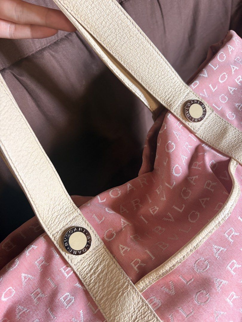 Bulgari Pink Monogram Canvas Tote Bag (Category: Luxury Bags & Wallets) located in Baguio. Submitted by cosmogyralfinds (Listing ID 1466783896, Image 2). Description: Pink monogram canvas tote bag by Bulgari. Cream leather handles and trim, gold tone hardware with logo detailing. Front slip pocket for easy access. Interior lined in light fabric with embossed leather brand tag. Spacious main compartment, comfortable shoulder strap drop. Classic Y2