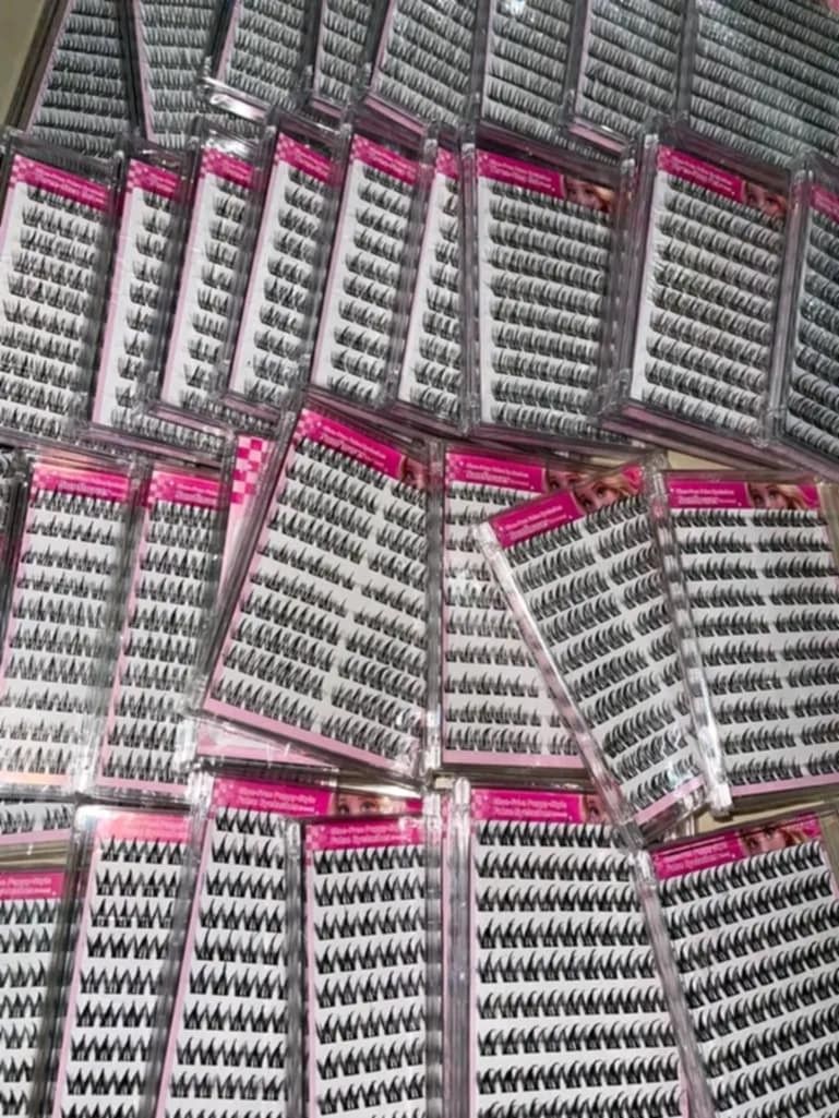 Bulk individual false eyelashes trays set (Category: Makeup) located in Paranaque City. Submitted by caramelmacchiato555 (Listing ID 1466946855, Image 1). Description: - Bulk set of individual false eyelash trays - Multiple boxes included, ready for use - Ideal for makeup artists or stocking up on supplies - Clear plastic packaging keeps lashes clean and organized - Sold as a complete set.