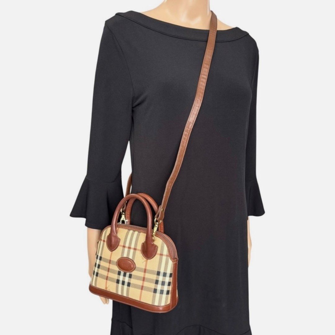 BURBERRYS Nova Check Shadow Mini Dome Handbag (Category: Luxury Bags & Wallets) located in Bauang. Submitted by thriftypockets92 (Listing ID 1466784865, Image 2). Description: Replaced chain sling.